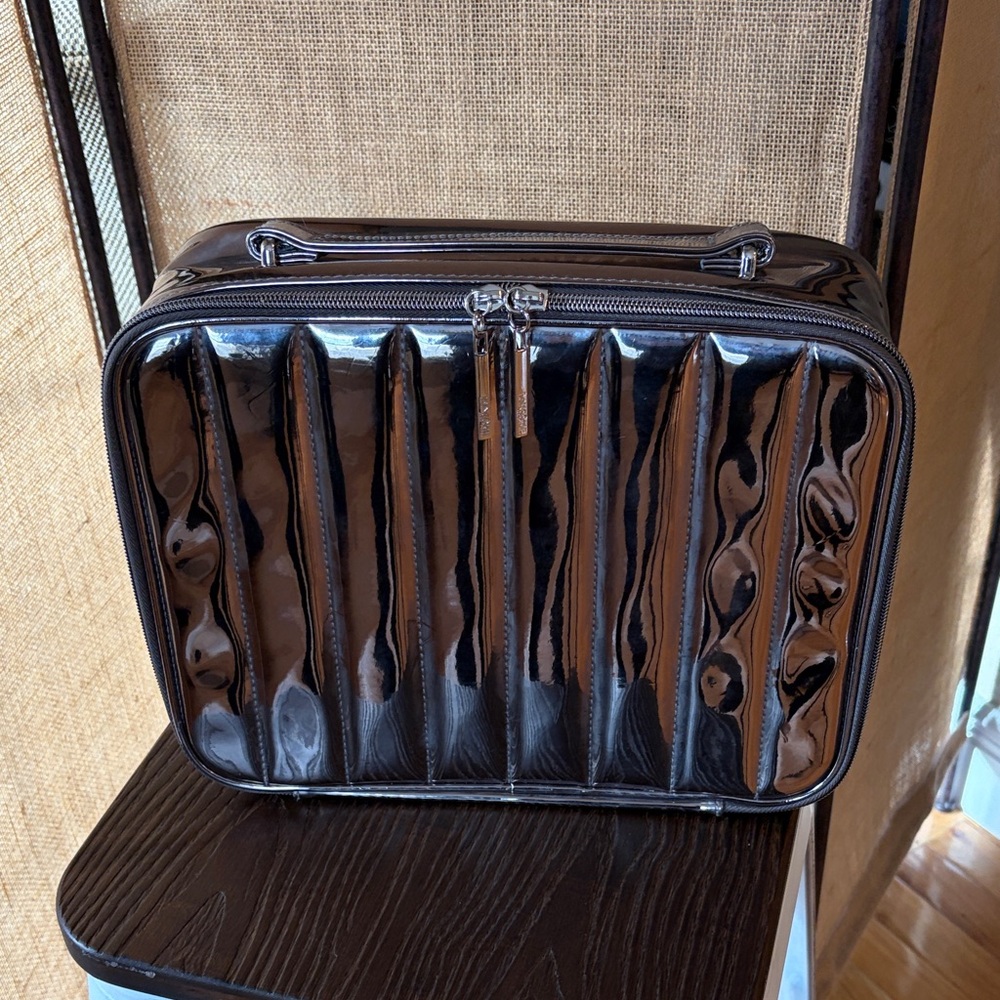Lancôme metallic gray cosmetic bag